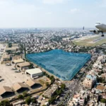 Plot between a civil airport and a military airbase needing defence and AAI NOC